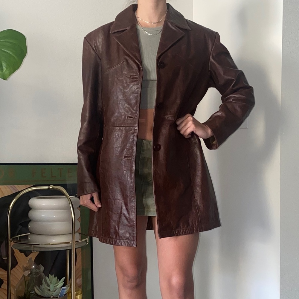 Wilson’s leather brown trench coat